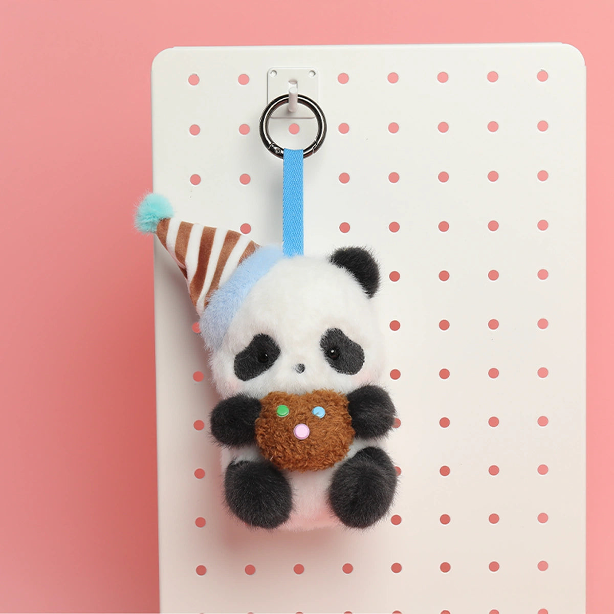 COOKIE BISCUIT panda plush keychain in a striped hat hugging a candy-dotted brown cookie, Panda Roll Party Series by 52TOYS