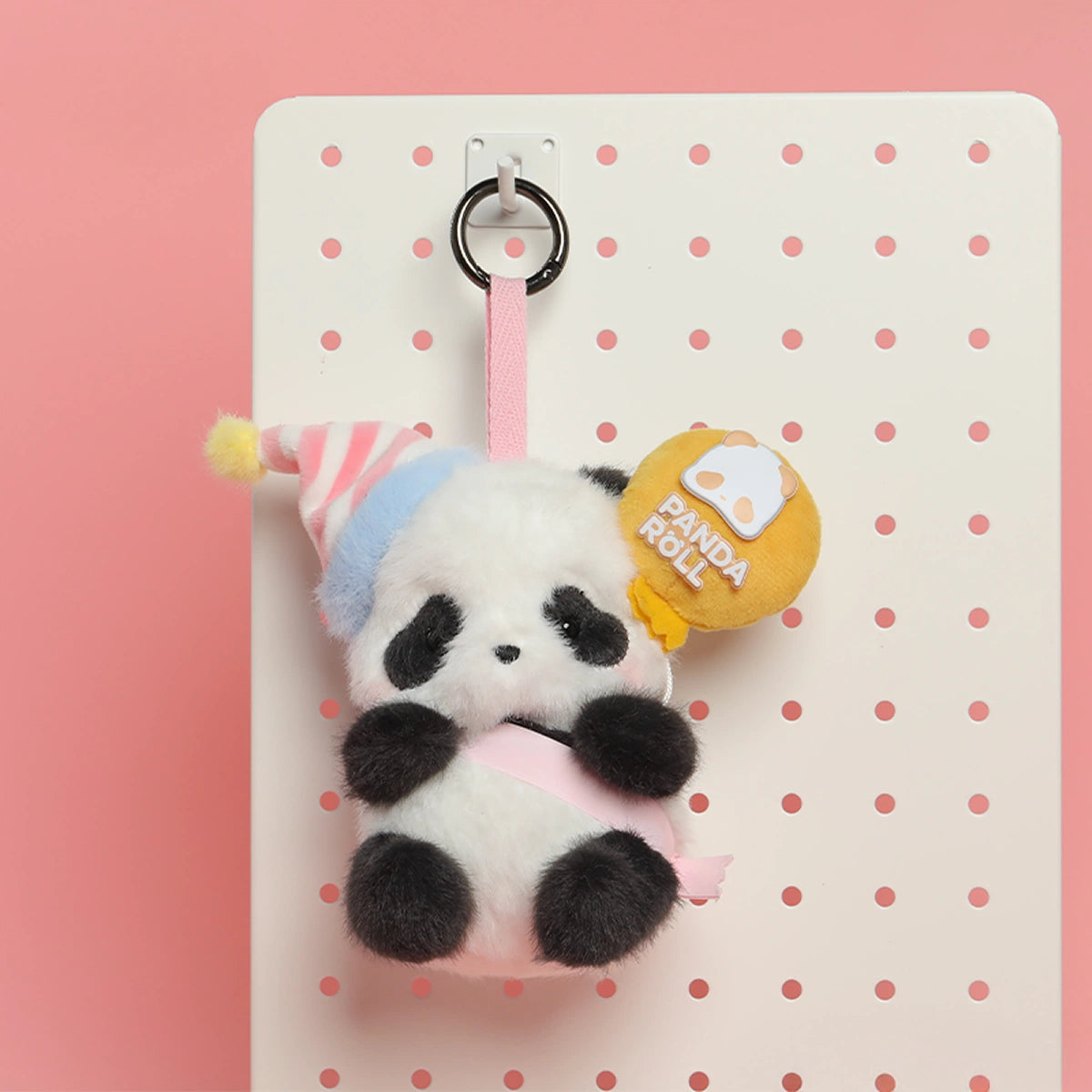 CUSTARD CREAM BALLOON panda plush keychain in a striped hat with a yellow PANDA ROLL balloon charm, Party Series by 52TOYS