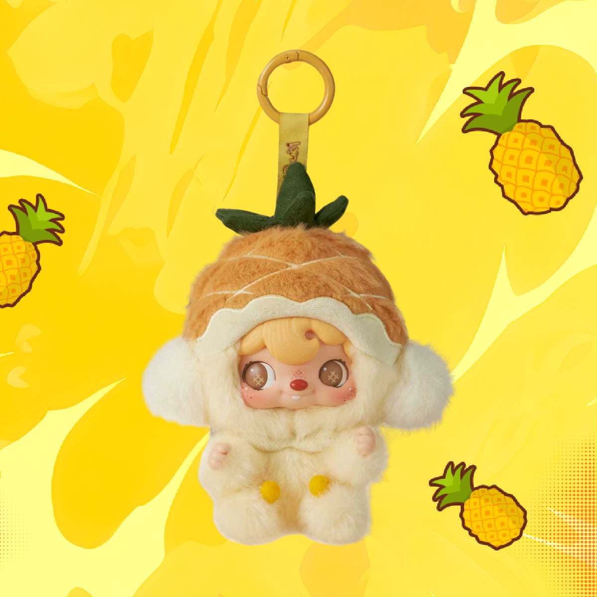 POUKAPOUKA Mini Pineapple vinyl plush charm on a bright yellow pineapple background