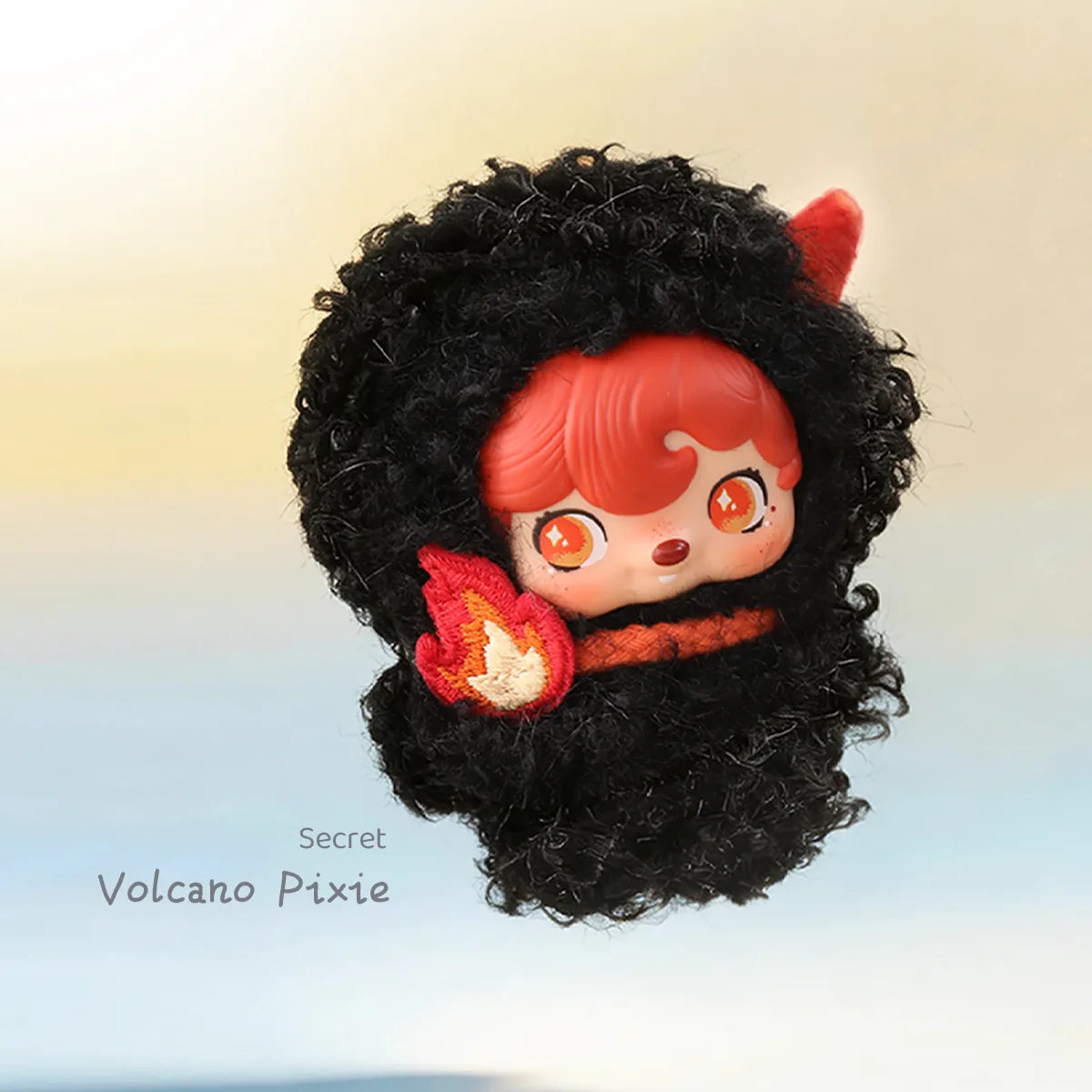 Secret Volcano Pixie, red-haired pixie in a black afro hood holding a flame, Pocket Cosmos by 52TOYS