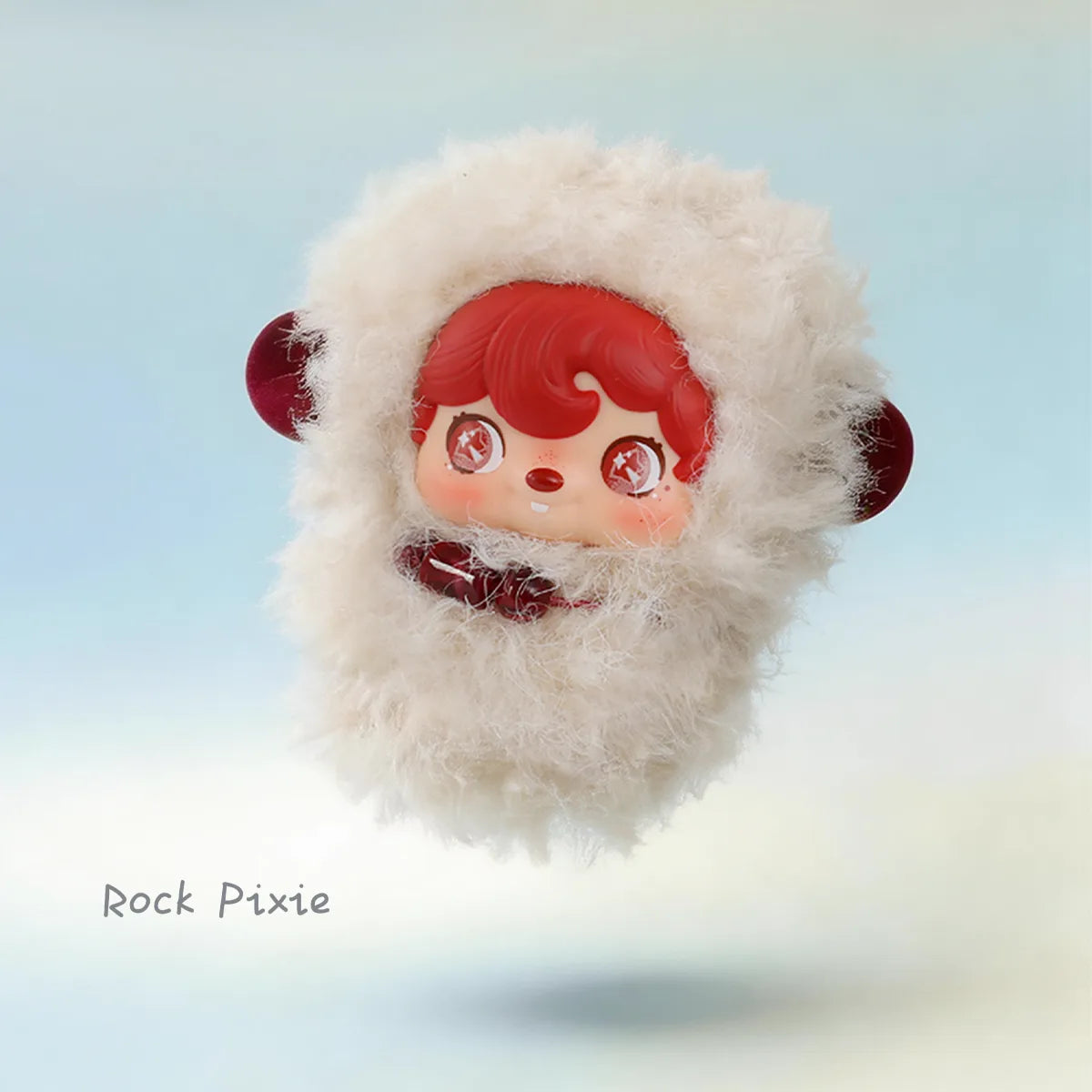 Rock Pixie, red-haired pixie in a cream hood with reddish round ears, POUKAPOUKA Pocket Cosmos by 52TOYS