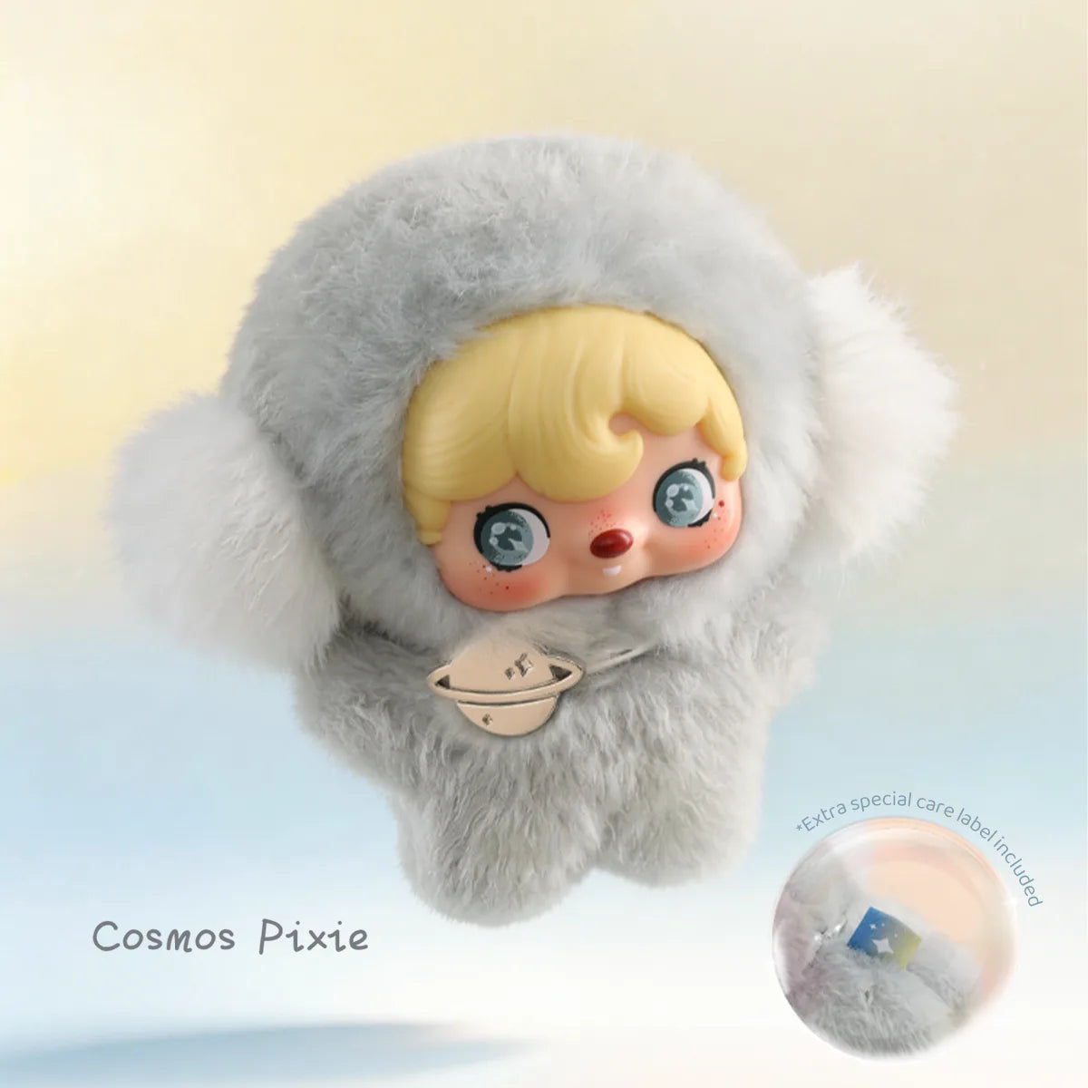 Cosmos Pixie, blonde pixie in a grey fluffy hood with a Saturn charm, POUKAPOUKA Pocket Cosmos by 52TOYS