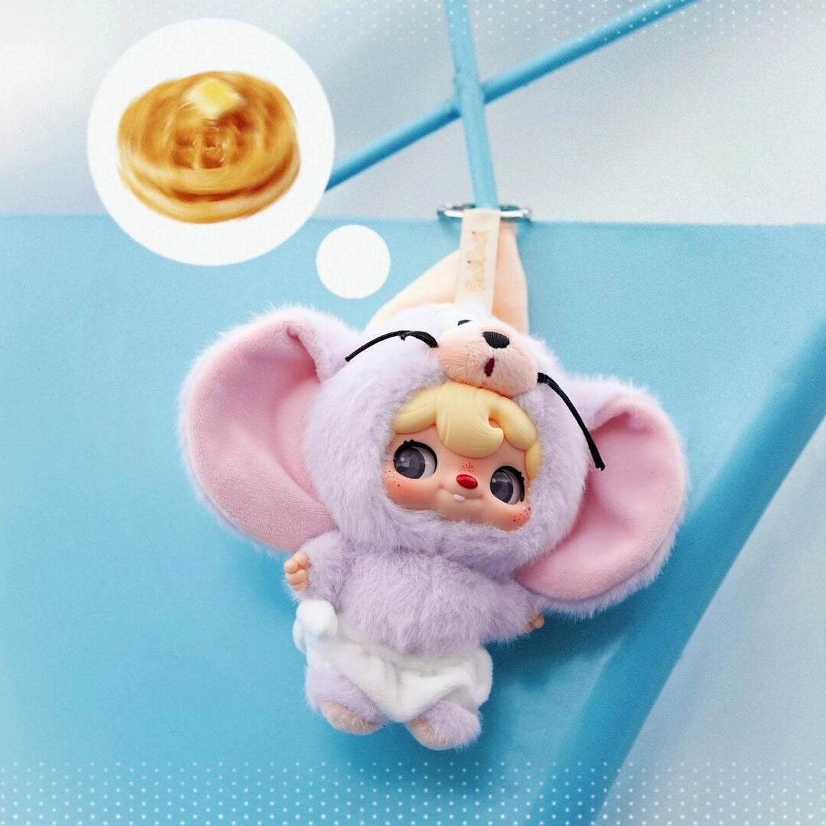 POUKAPOUKA gray Tom costume hanging by its loop with a waffle thought bubble