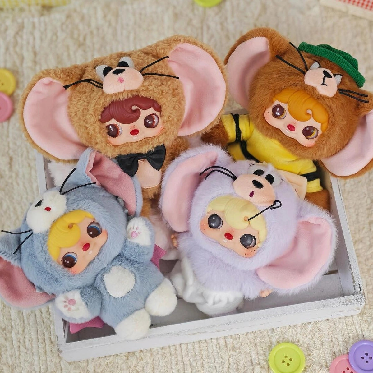 Four POUKAPOUKA Tom and Jerry costume plush toys arranged in a white tray
