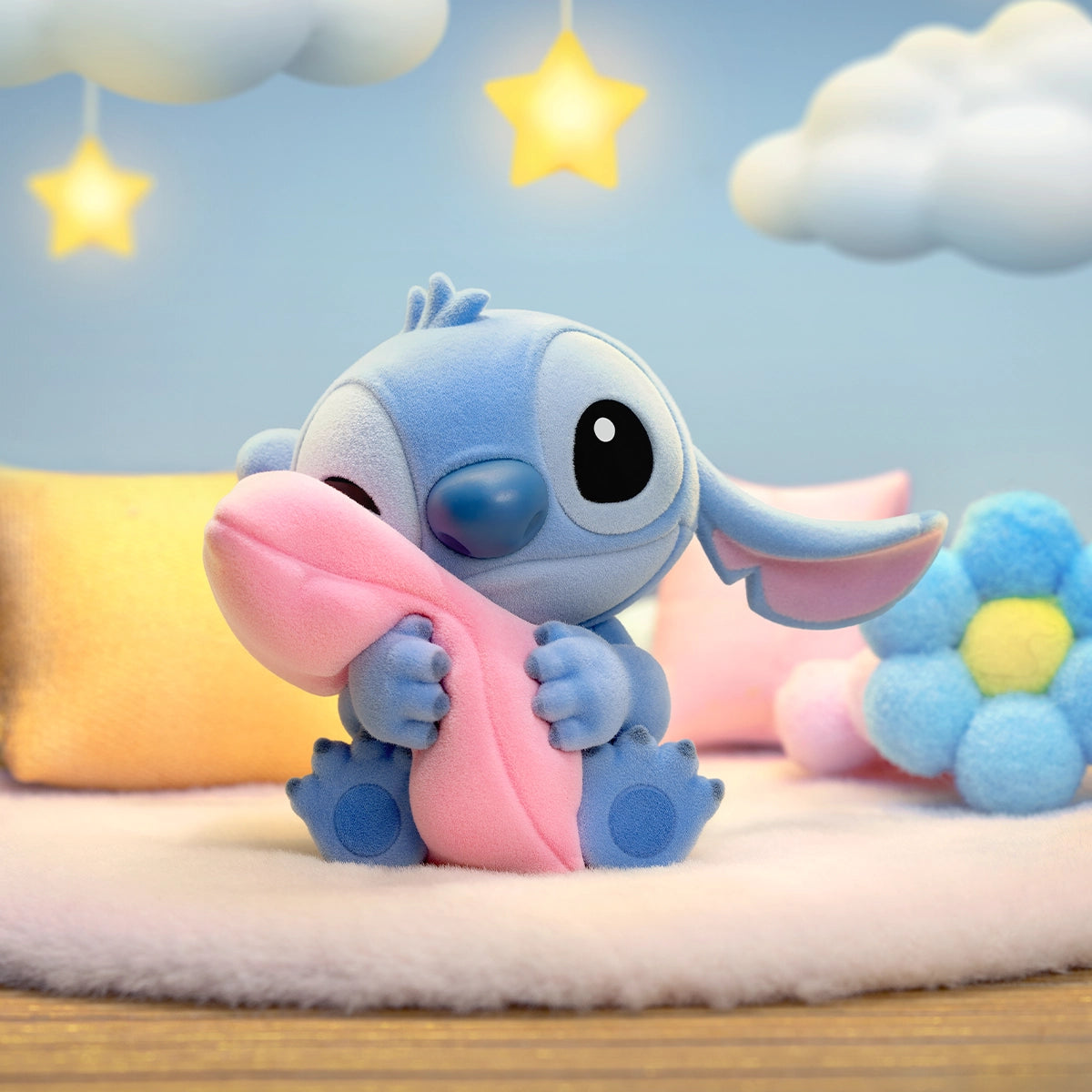 Stitch hugging a large pink heart cushion in a pastel bedroom