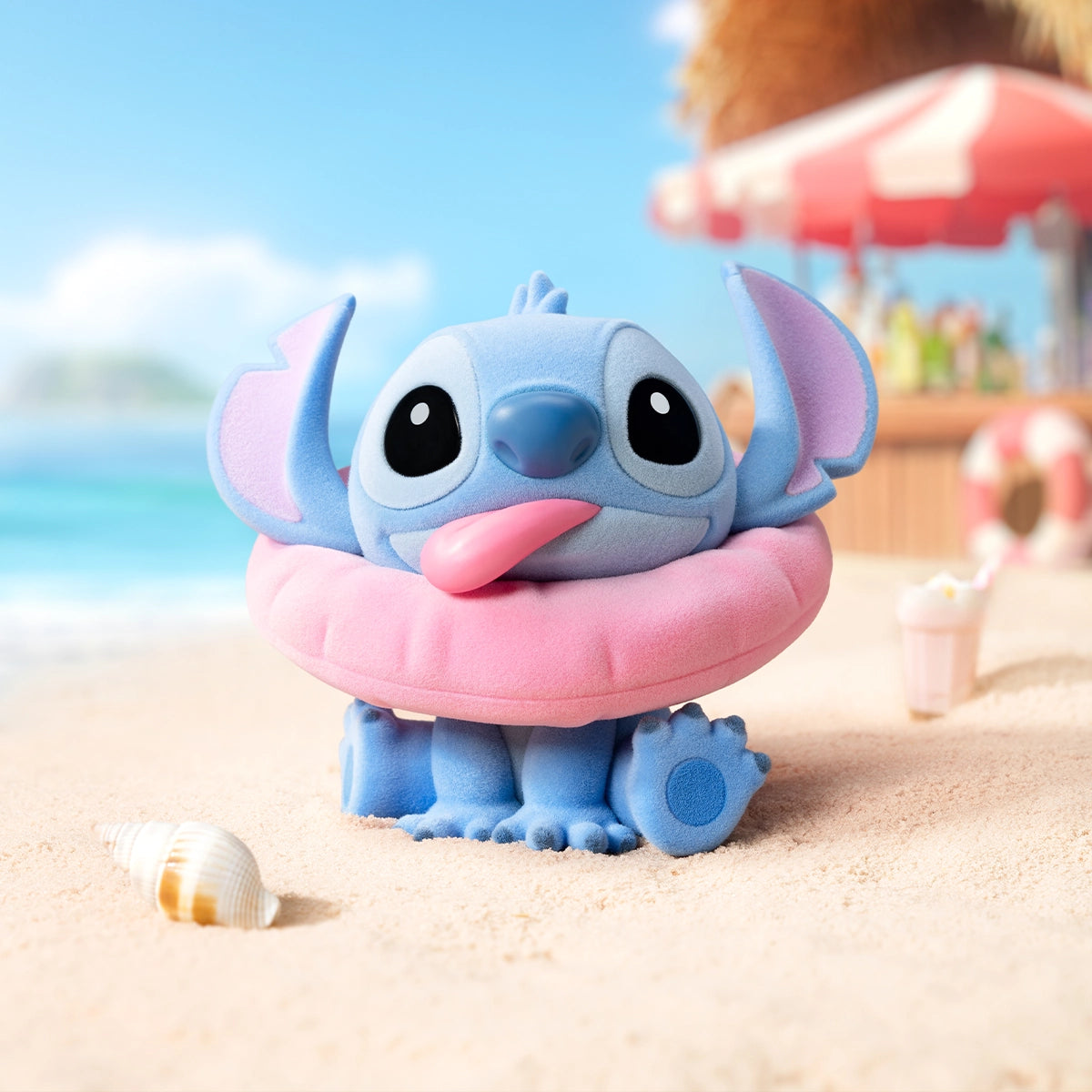 Stitch wearing a pink neck pillow on a sunny beach