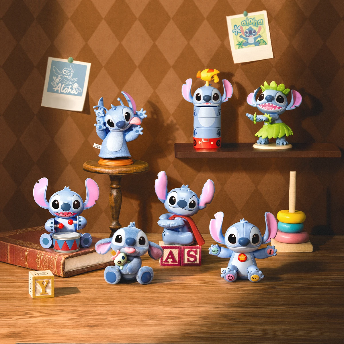 Six Stitch Vintage Collection figures arranged with wooden blocks and classic toys