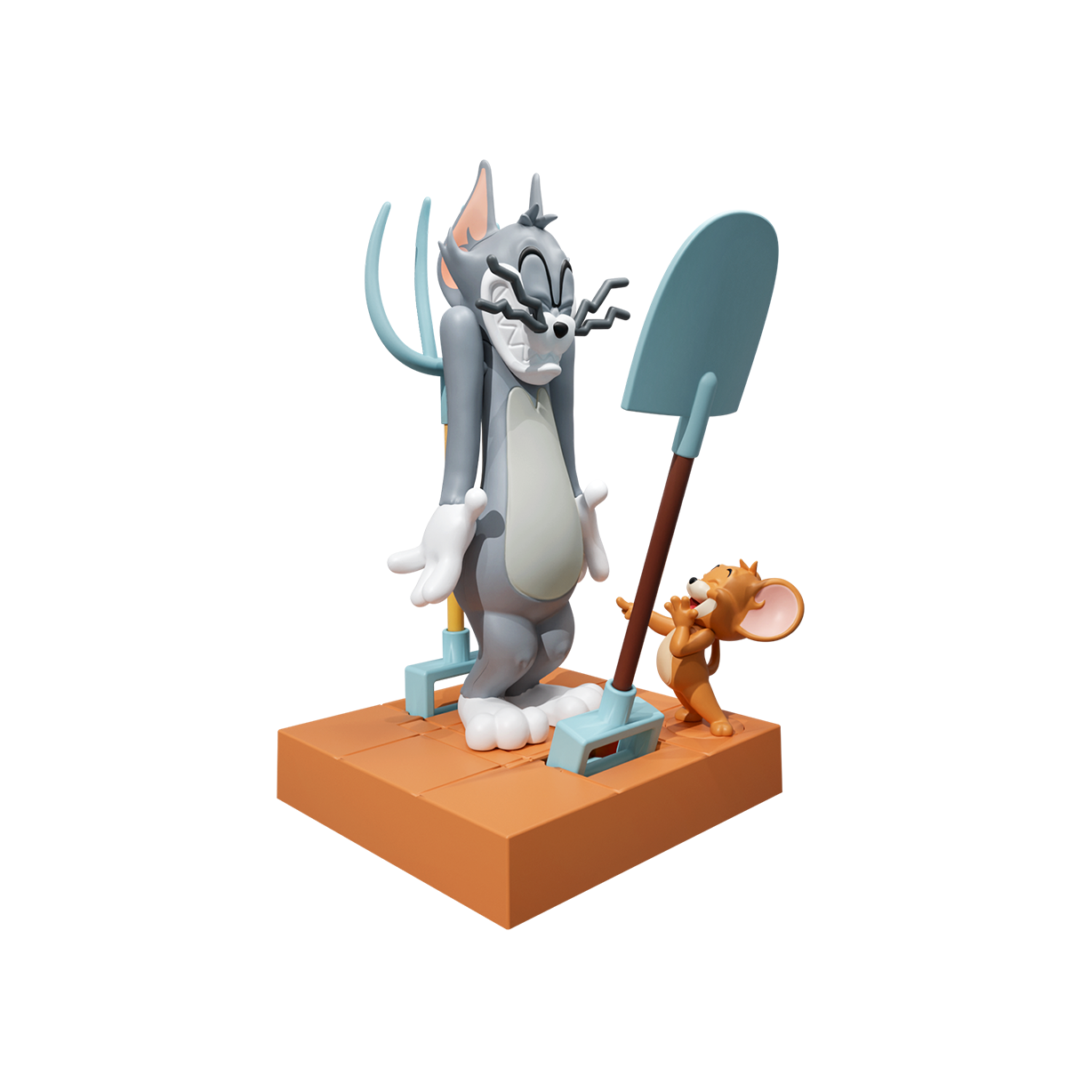 Double Trap, dazed Tom trapped between teal pitchfork and shovel as Jerry grins, Tom and Jerry Inseparable Chaos