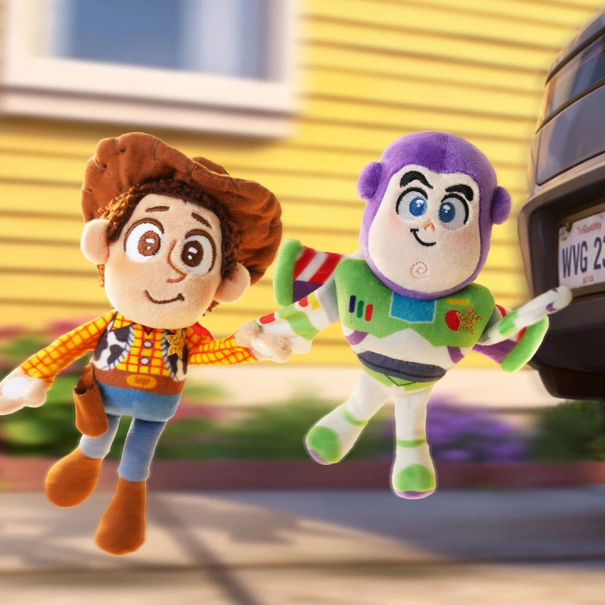 Woody and Buzz Lightyear plush keychains from the Toy Story Warm Embrace Series